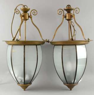 The Golden Compass - Seven bronze coloured pendant ceiling lights, from the corridor at the… | Ewbank’s