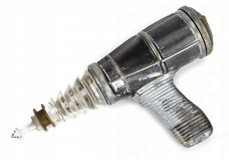 Forbidden Planet hero illuminating laser pistol. | Profiles in History