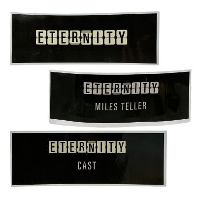 Lot 30: Eternity Larry (Miles Teller) Production Used Miles Teller, Cast & Eternity Chairback Nameplate Set | VIP Fan Auctions