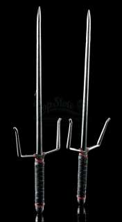 Marvel‘s Daredevil - Lot 251 - Elektra Natchios‘ Stunt Red and Black-Handled Sais