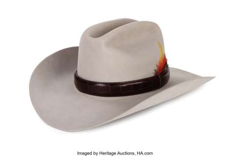 Larry Hagman "J. R. Ewing" signature hat worn during the filming of Dallas, signed by Hagman. ...